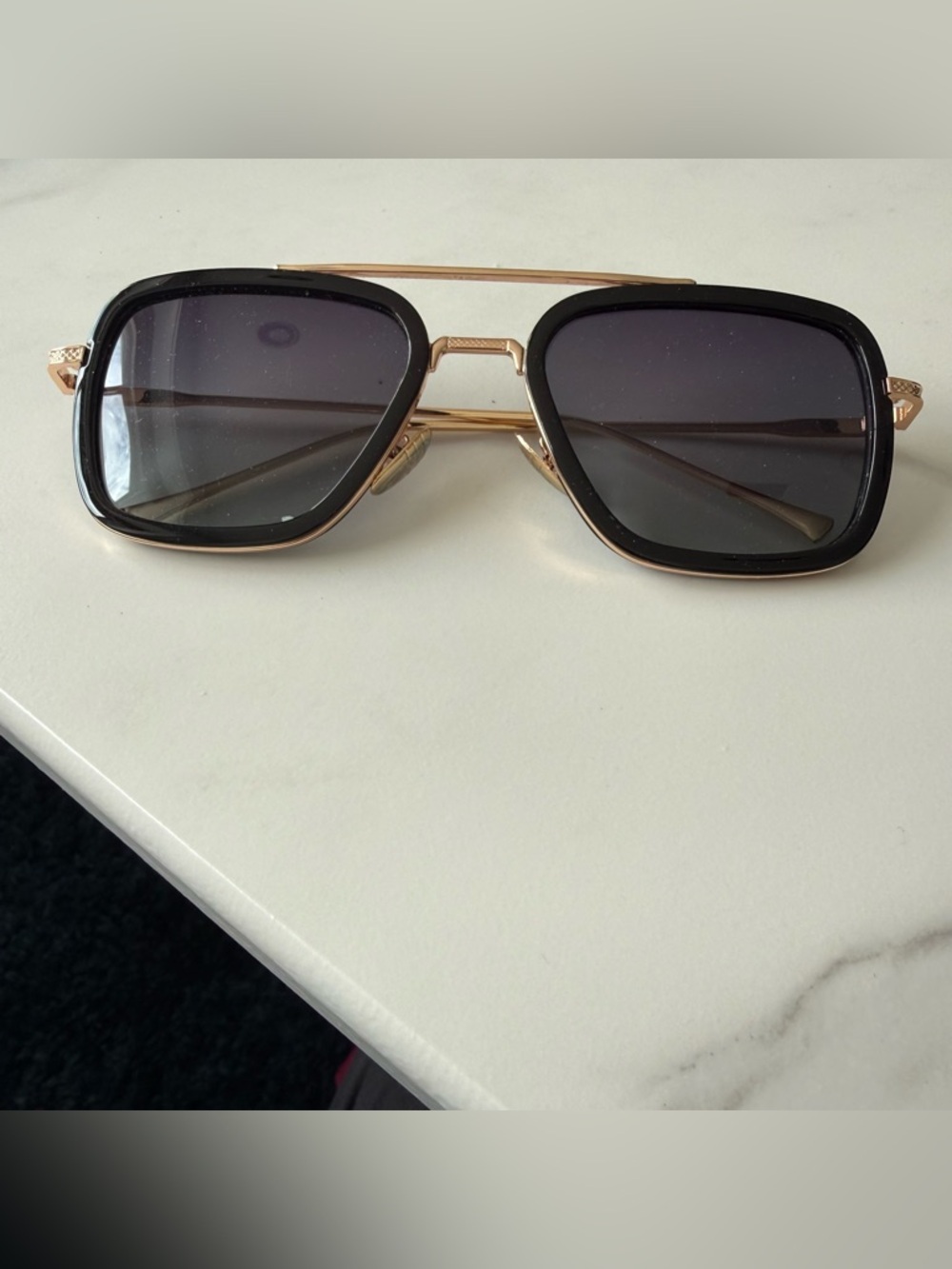 Oversized men's sunglasses with gold frames